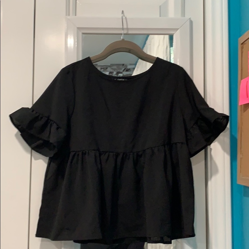 black ruffle shirt